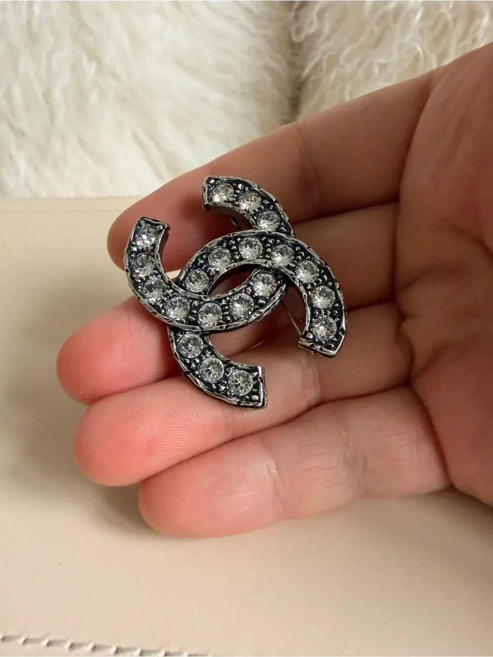 CHANEL double brooch